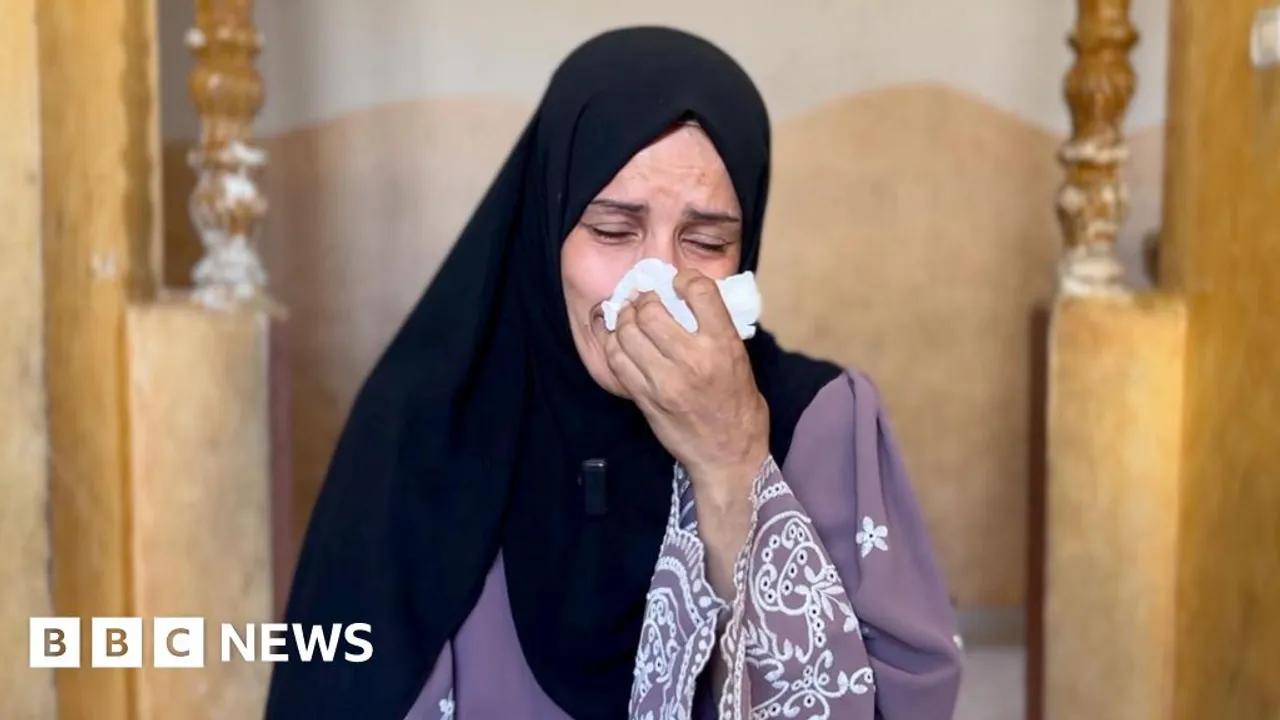 Mother Mourns Sons Killed In Israeli Strike While Awaiting Aid In Gaza Image