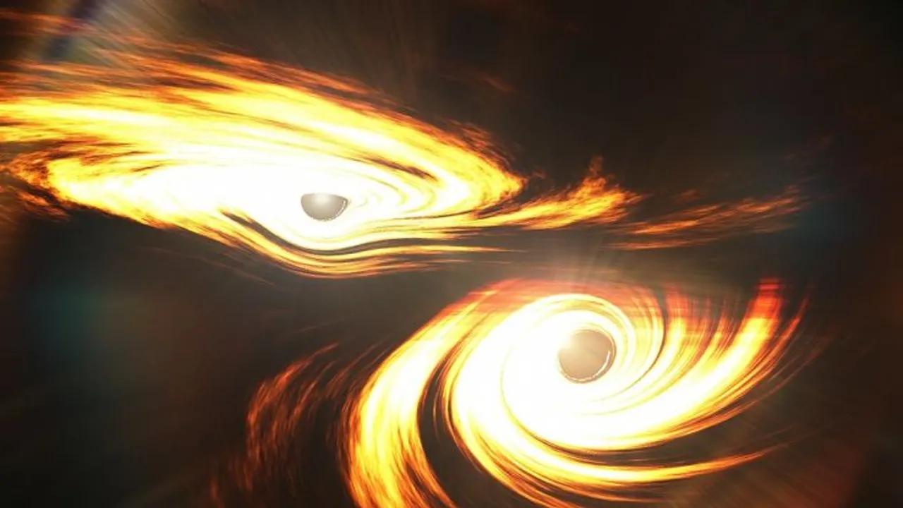 Astronomers Detect Record Black Hole Collision Image
