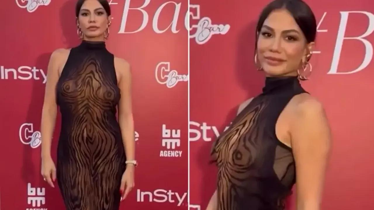 Demet Özdemir'in Şık ve Cesur Elbisesi Geceye Damgasını Vurdu Image